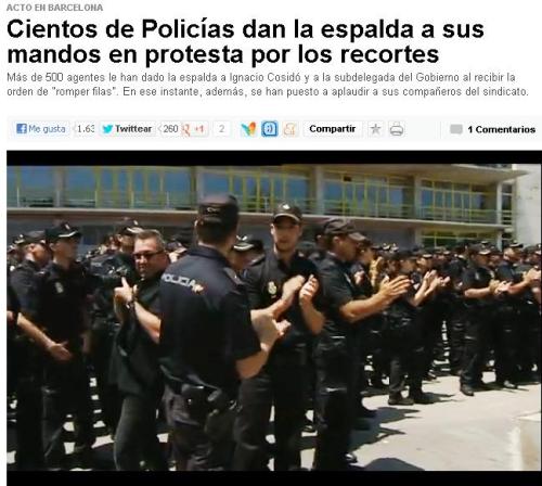 ESPAÑA SALE A LA CALLE ,EN CONTRA DE LA POLITICA DEL PP - Página 37 Policias-espaldas